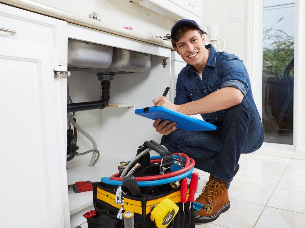 a plumber working