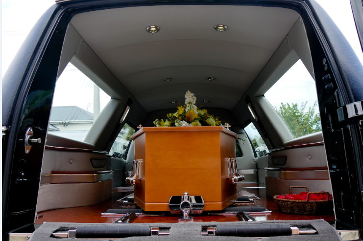 casket inside of car