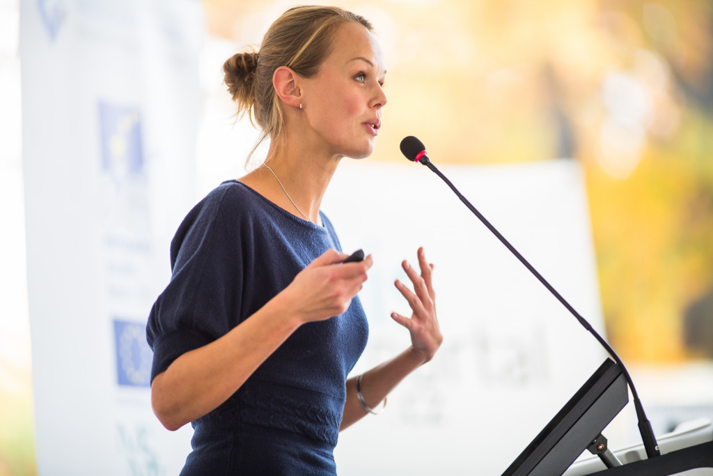 female motivational speaker delivering an inspiring speech
