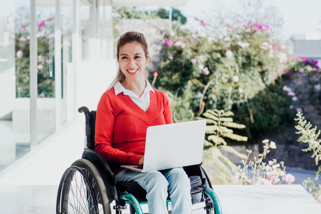 female employee in a wheelchair working